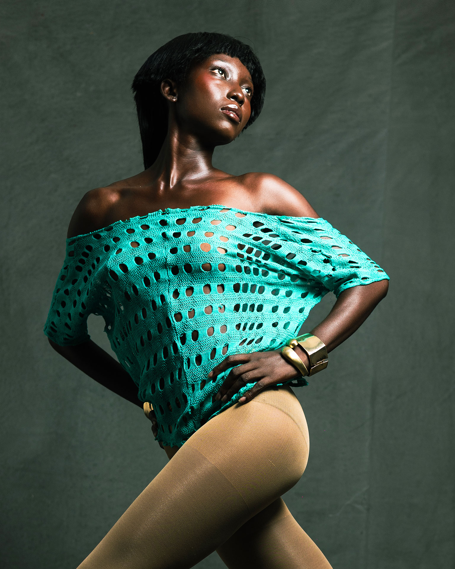 Three-quarter studio portrait looking upward